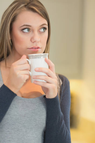 istock Woman drinking cup of coffee 847222012