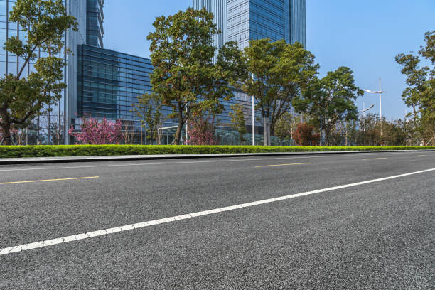 istock City empty road with modern buildings background 847223146