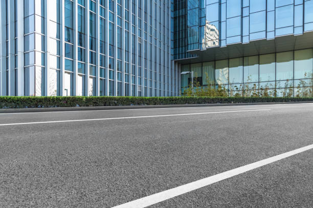 istock City empty road with modern buildings background 847225854