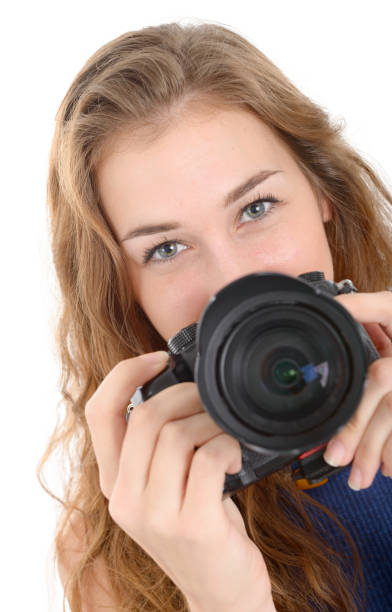 istock Beautiful smiling woman with digital camera. Isolated on white background 847227542