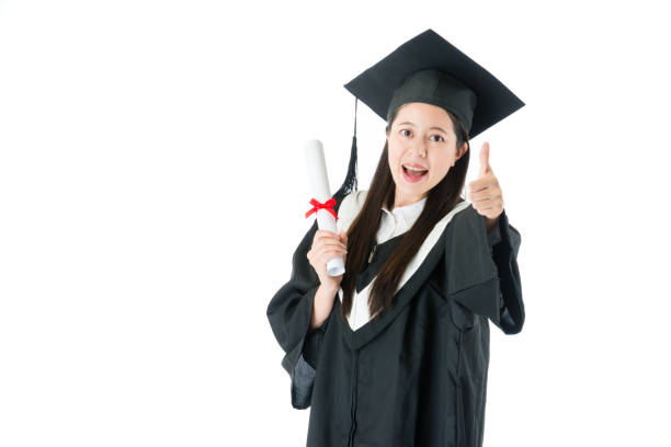 istock graduate holding college diploma certificate 847227616