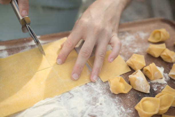 istock chef preparing handmade stuffed pasta tortellini 847248416