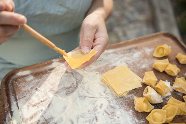 istock chef preparing handmade stuffed pasta tortellini 847249290