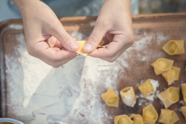 istock chef preparing handmade stuffed pasta tortellini 847249432