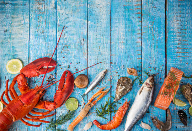 istock Fresh tasty seafood served on old wooden table 847252482
