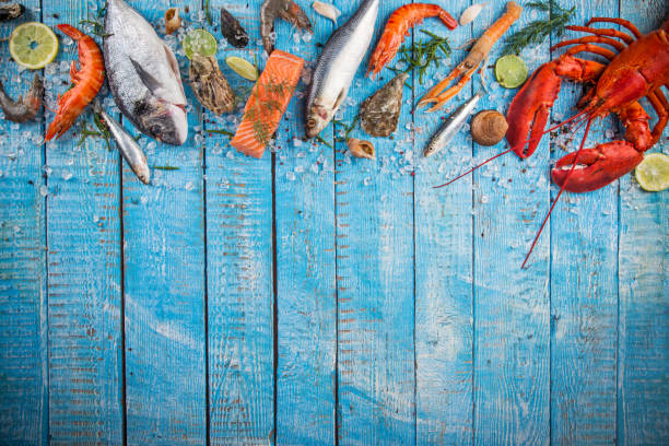istock Fresh tasty seafood served on old wooden table 847252628