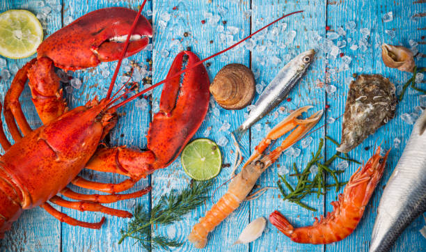 istock Fresh tasty seafood served on old wooden table 847252724