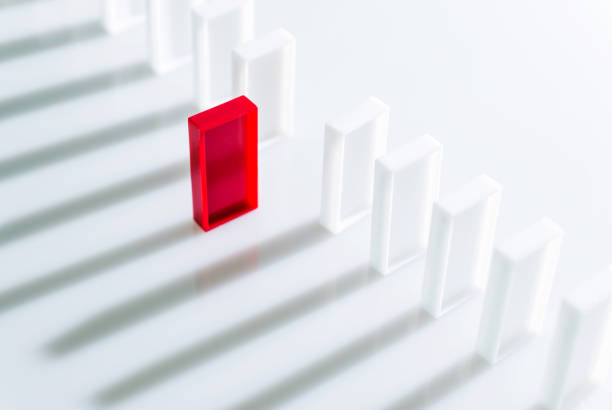 istock The red domino stands out 847252790