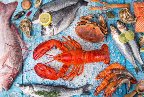 istock Fresh tasty seafood served on old wooden table 847252882
