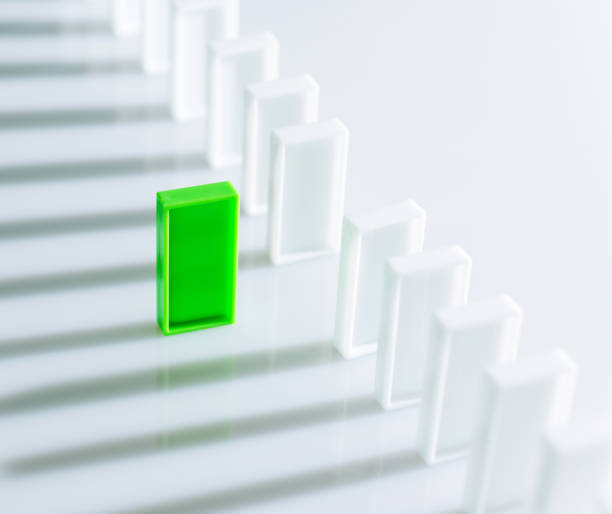 istock The green domino stands out 847252926