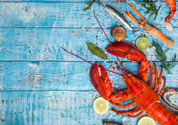 istock Fresh tasty seafood served on old wooden table 847253280