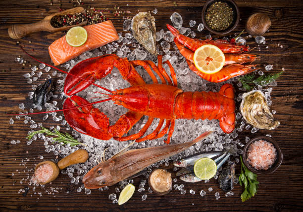 istock Fresh tasty seafood served on old wooden table 847253620