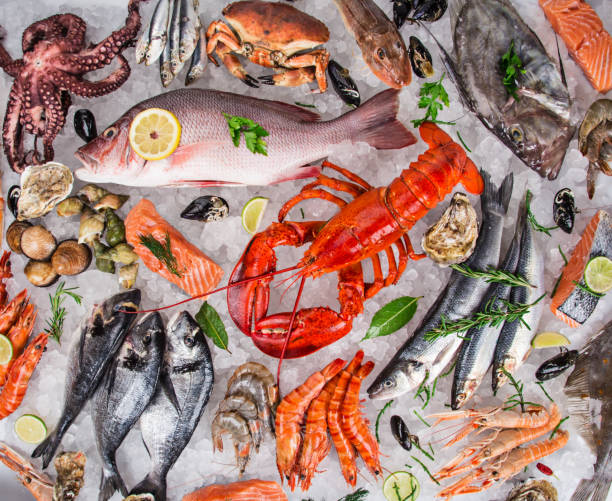 istock Fresh tasty seafood served on old wooden table 847256060