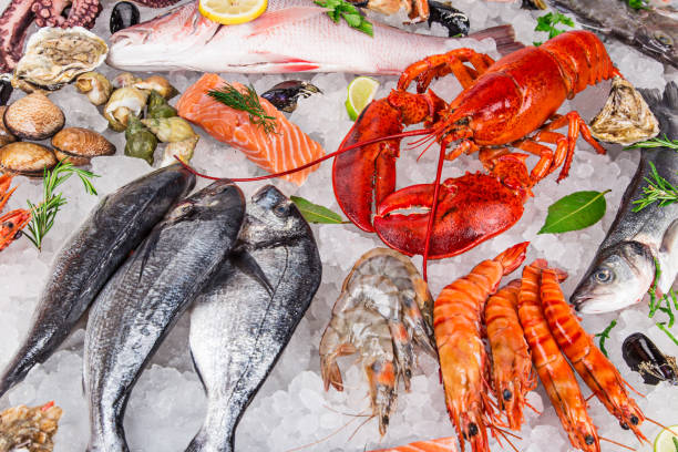 istock Fresh tasty seafood served on old wooden table 847256222