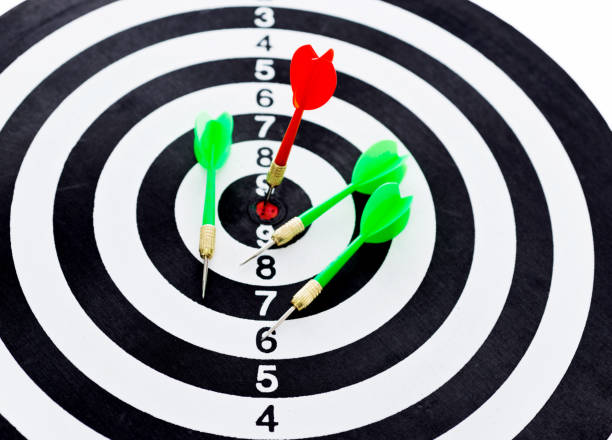 istock Red and green dart arrows on dartboard 847257414