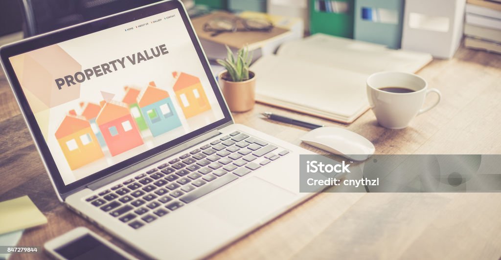 PROPERTY VALUE CONCEPT Real Estate Stock Photo