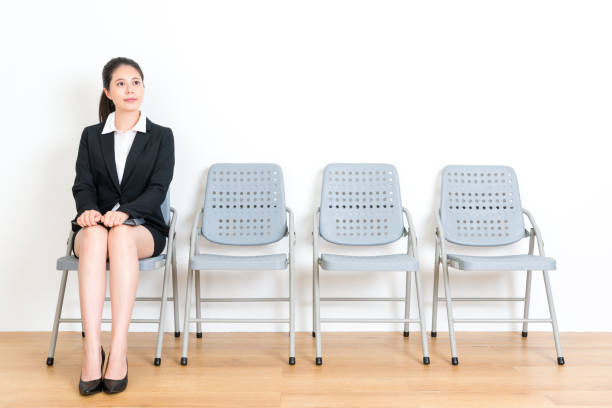 istock smiling beautiful suit girl carrying document 847280628