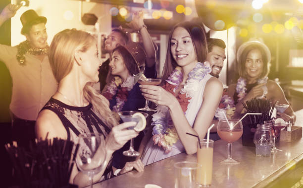 istock Two female are having fun and drinking cocktails 847280892