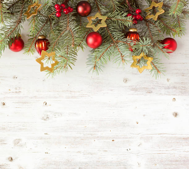 istock Christmas decoration on old grunge wooden board 847287688