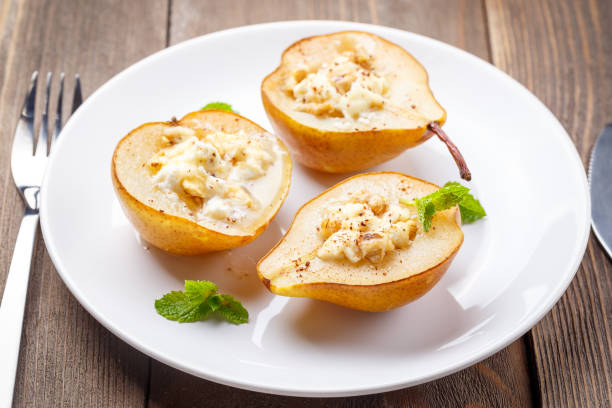 istock Pear with ricotta cheese, honey and cinnamon 847288108