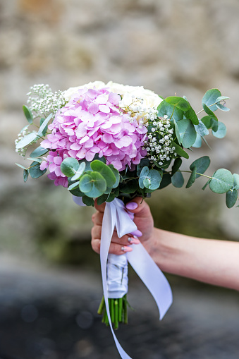 Bouquet of purple hydrangeas. The concept is a holiday, a wedding, marriage, a ceremony.
