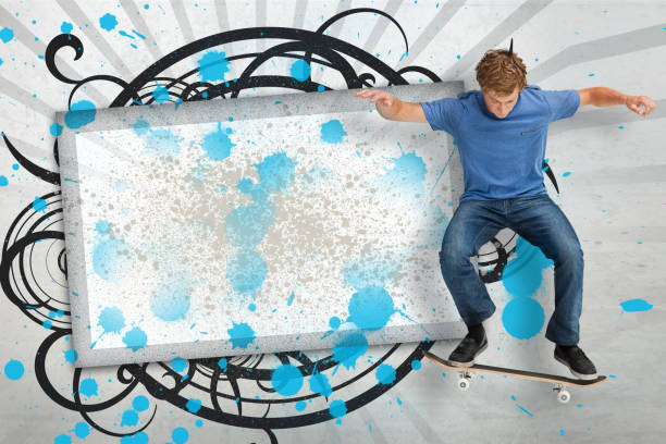istock Skateboarder mid ollie in front of copy space screen 847300682