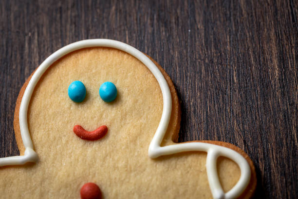 istock Christmas cookies on wooden table 847308440