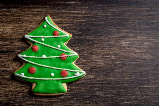 istock Christmas cookies on wooden table 847308510