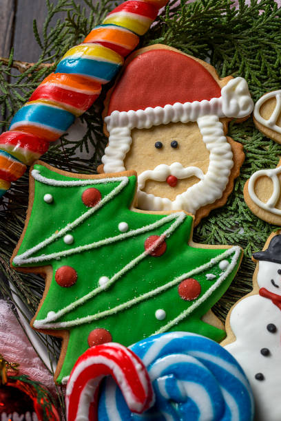 istock Christmas cookies on wooden table 847308590