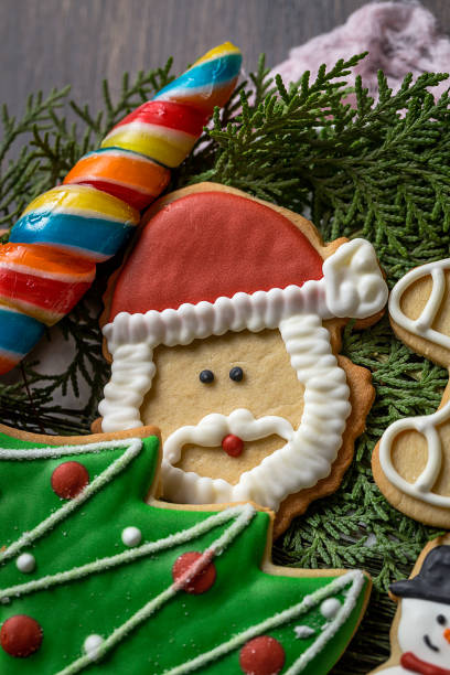 istock Christmas cookies on wooden table 847308594