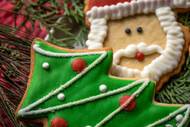 istock Christmas cookies on wooden table 847310792