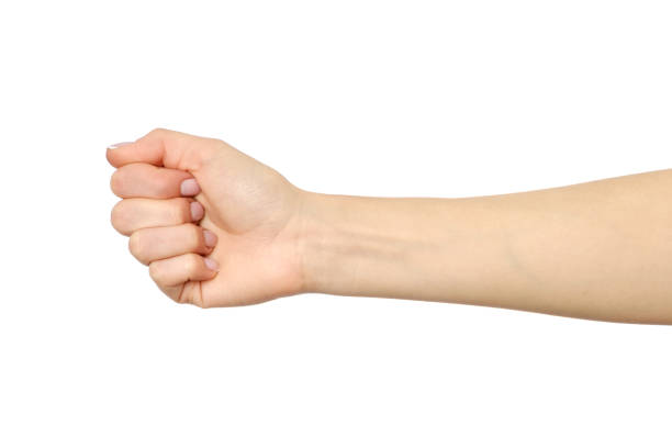 istock Female hand showing wrong fist gesture isolated on white 847322502