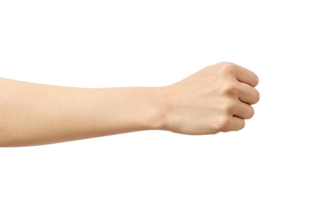 main de femme avec fist geste isolé sur blanc - poing photos et images de collection