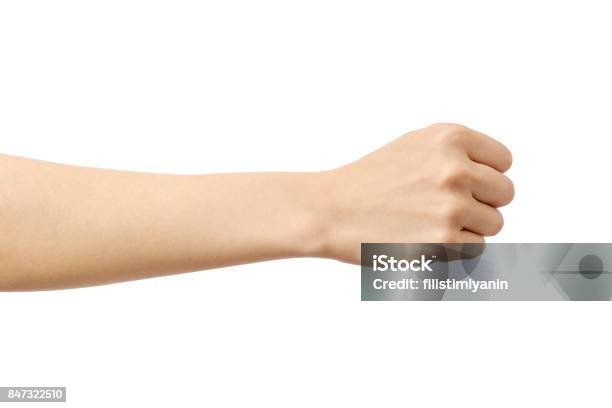 Womans Hand With Fist Gesture Isolated On White Stock Photo - Download Image Now - Hand, Fist, Women