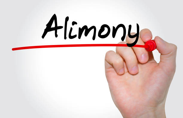istock Hand writing inscription Alimony with marker, concept 847325864