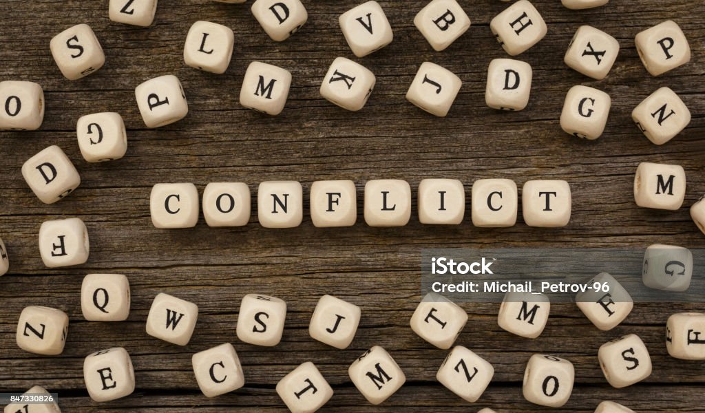 Word CONFLICT written on wood block Word CONFLICT written on wood block,stock image Conflict Stock Photo