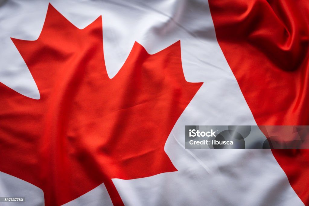 Gros coup de studio du drapeau canadien réel - Photo de Drapeau canadien libre de droits