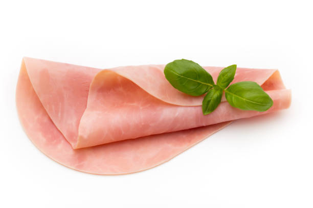 istock Thin slices of ham on white background. 847338642