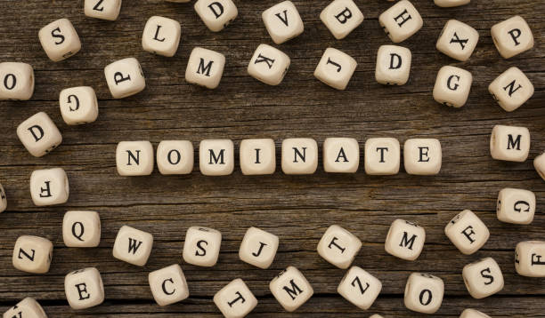 Word NOMINATE written on wood block Word NOMINATE written on wood block,stock image nomination stock pictures, royalty-free photos & images
