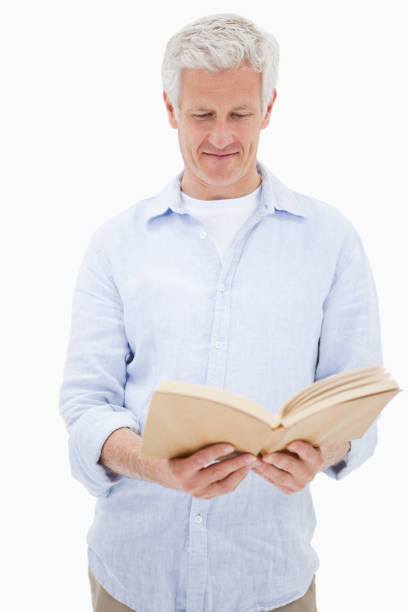 istock Portrait of a man reading a book 847342430