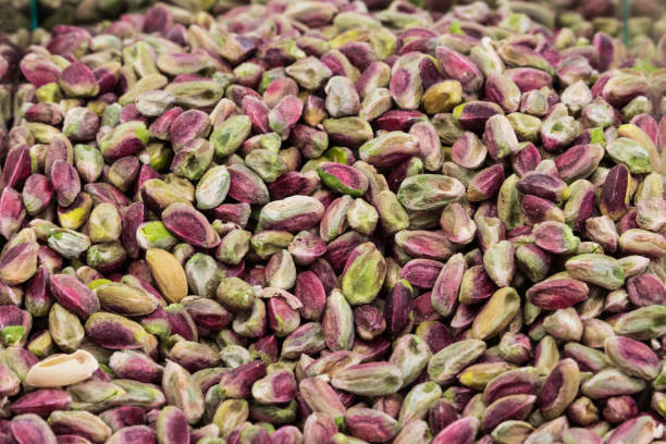 istock colorful green and purple nuts 847364782