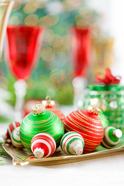 istock Christmas Dinner Table Setting Tree Napkins Red Yellow Wineglasses 847367808