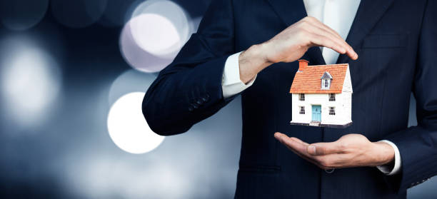 istock home in business man hand 847368060