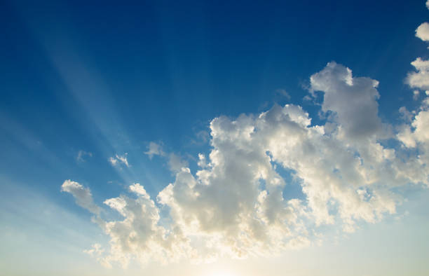 istock Blue sky background with beautiful bright clouds and sun beams.Summer cloudscape. 847372510