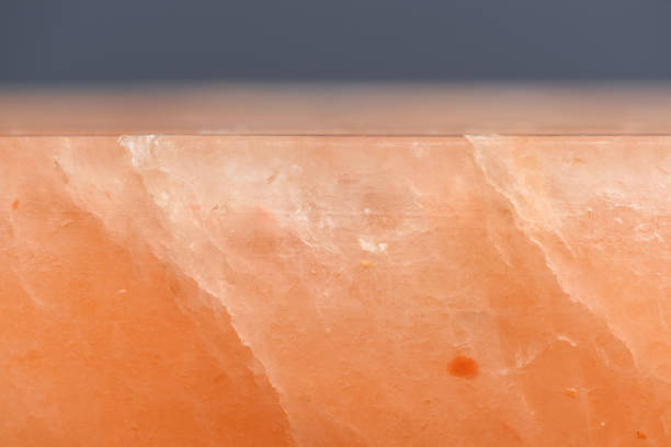 Hymalayan pink salt block with cracks side view closeup