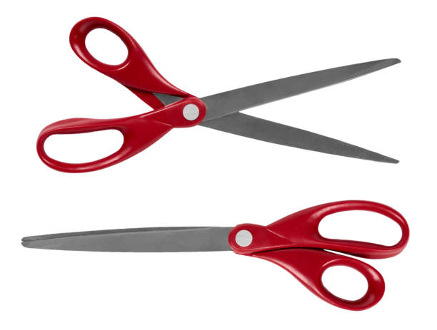 red office scissors isolated on a white background stock photo