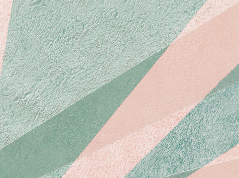 Abstract background with acrylic colors in shades of green and pink