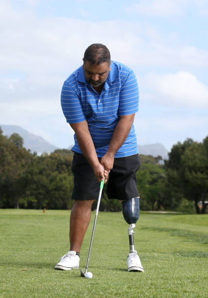 istock A man with a leg amputee playing golf 847416208