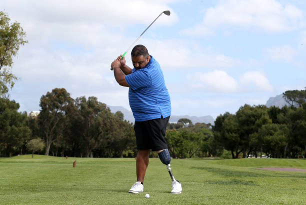 istock A man with a leg amputee playing golf 847418462