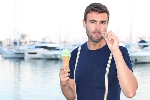 istock Male eating an ice cream with a spoon 847418978